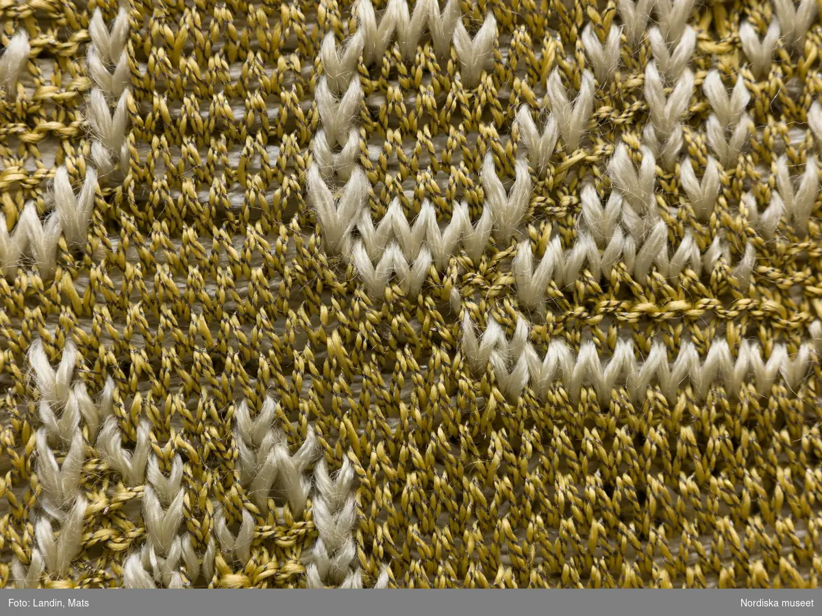 Tröja av gult silke. Silketröja. 1600-tal. 
NM  inv.nr 221941