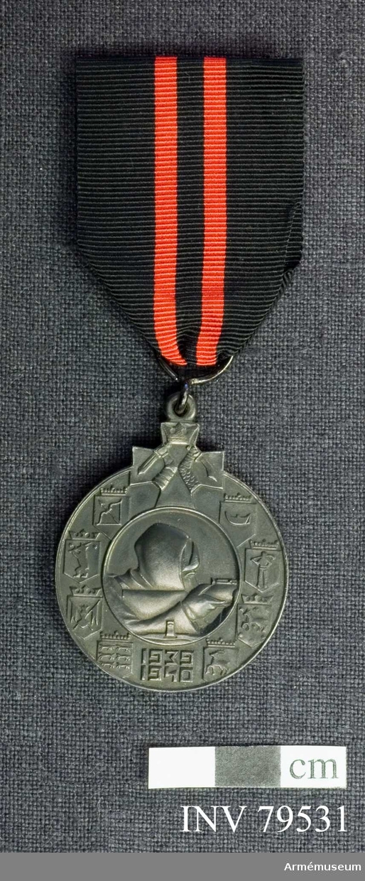 Minnesmedalj i brons. Utdelas för utlännings deltagande i 1939-1940 års krig.