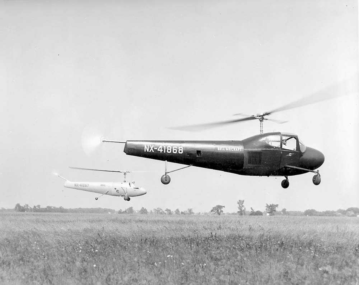 2 helikoptere i luften. Bell modell 30.