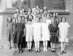 Klassebilde. Lillehammer folkesskole 4D 1925. Lærer og eleve