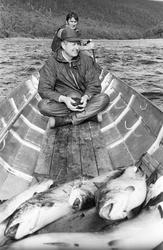 Elvebåt i landskap.