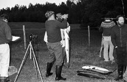 Fangst med person(er).