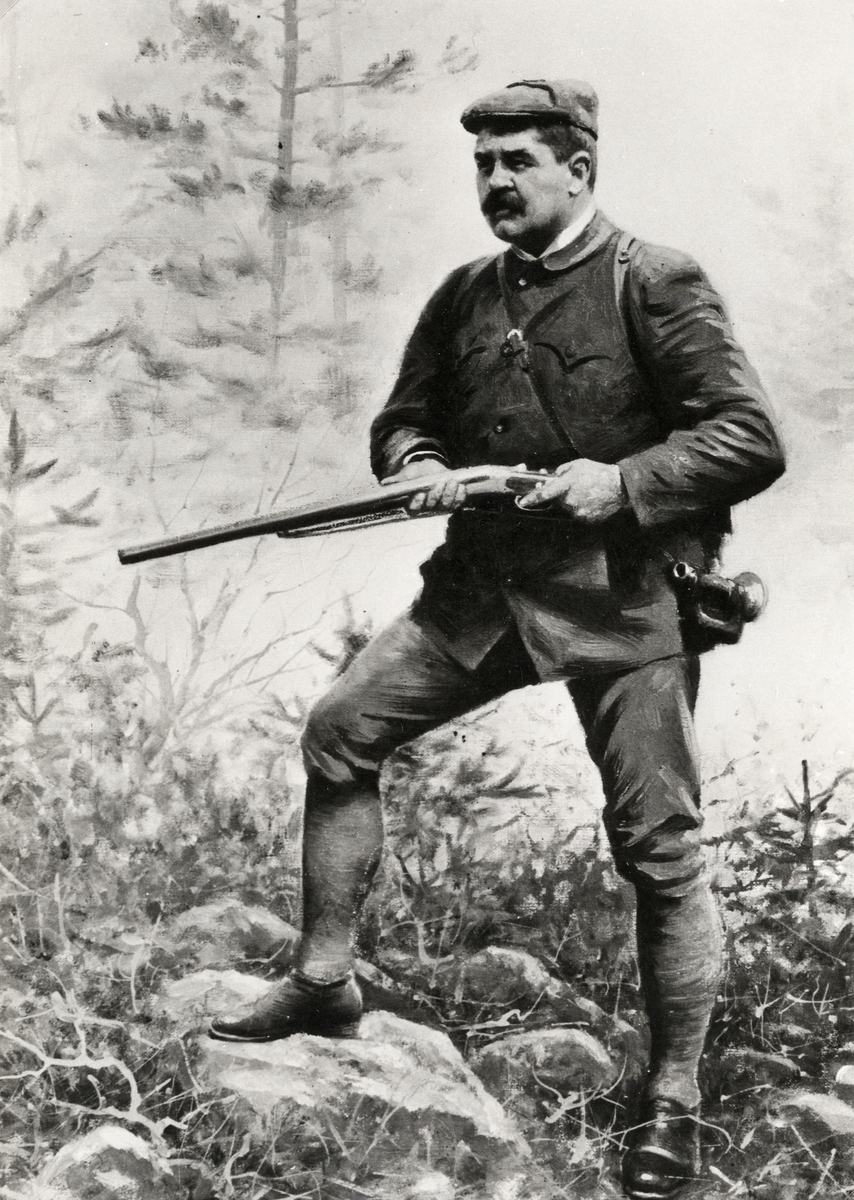 En man i jaktkläder poserar med ett gevär, ca 1900. Foto av oljemålning.