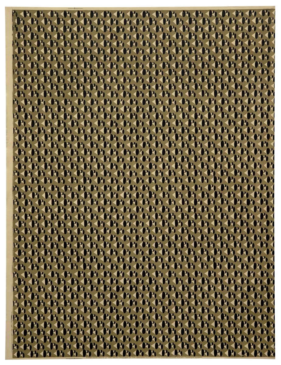 Rektangulært dekorativt papir med mønsteret "Faldskærm". Forsiden er dekorert med et repeterende mønster av koniske former i ulik størrelse - vekslende mellom sort og kremhvite partier - på grå bunn. Mønsteret skal forestille stiliserte fallskjermer.
