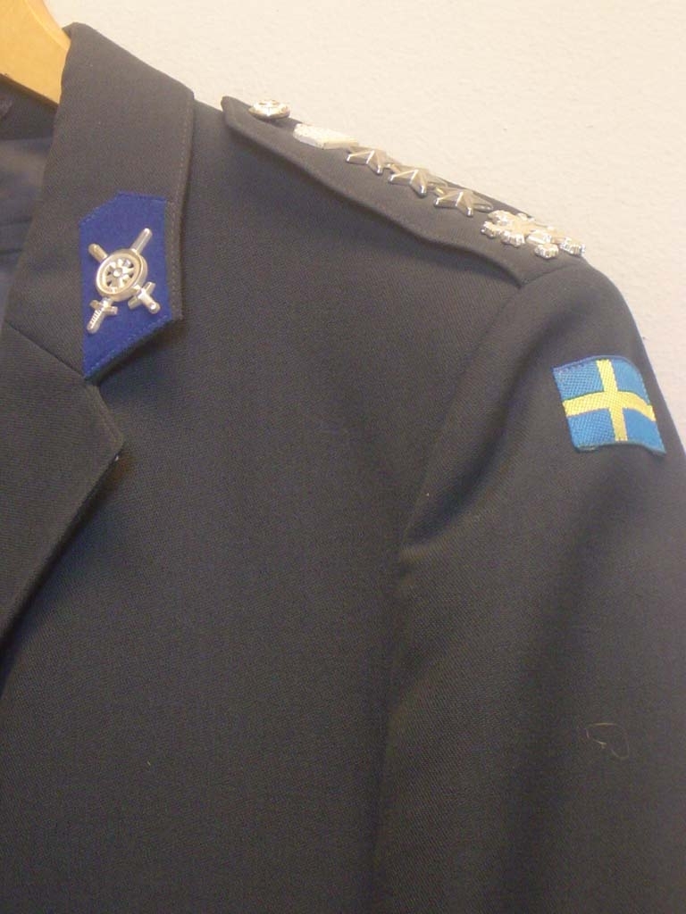 Överste vid Göta Trängregemente, T2. Generalstabskårens märke på vänster ficka.