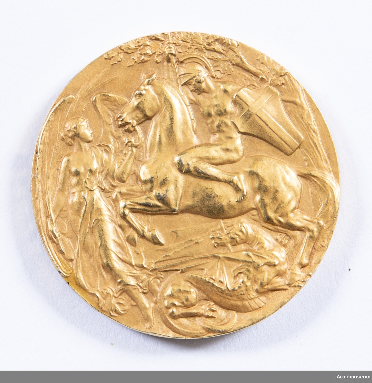 Grupp M II.
Guldmedalj vunnen av Oscar Gomer Swahn i löpande hjort, enkelskott, lag, OS 1908 i London.