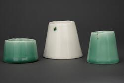 A Group of Green and White Pots [Bolle]