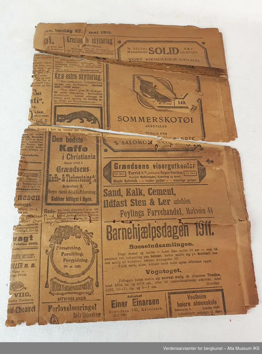 Avisa Norske Intelligenz-Seddeler fra 27. mai 1917. Gjenstanden er i svært dårlig stand og består av mange enkeltfragmenter.