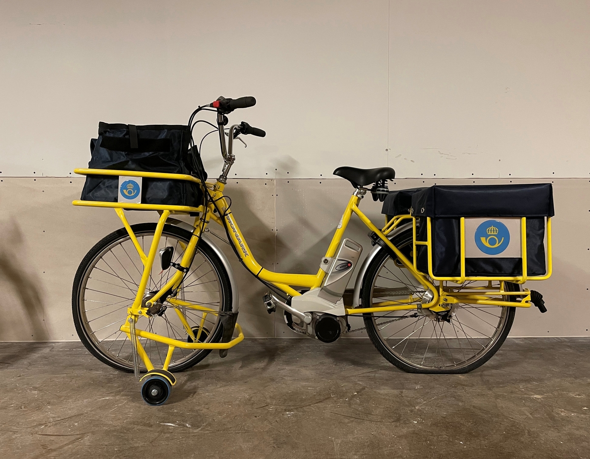 Brevbärarcykel. Elcykel.

Plats för en packkorg fram och två bak.
