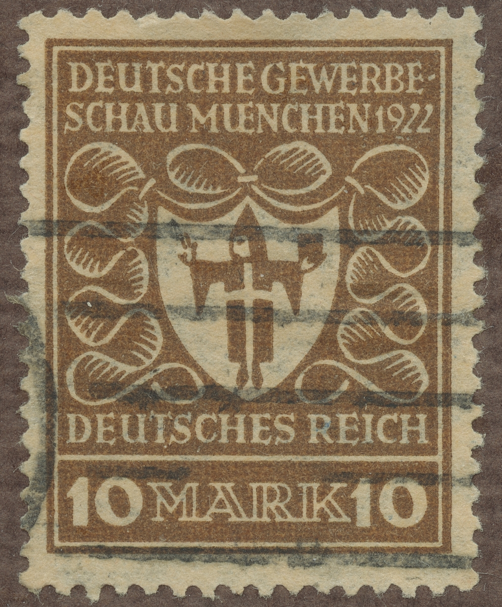Frimärke ur Gösta Bodmans filatelistiska motivsamling, påbörjad 1950.
Frimärke från Tyskland, 1922. Motiv av Utställningen i München 1922