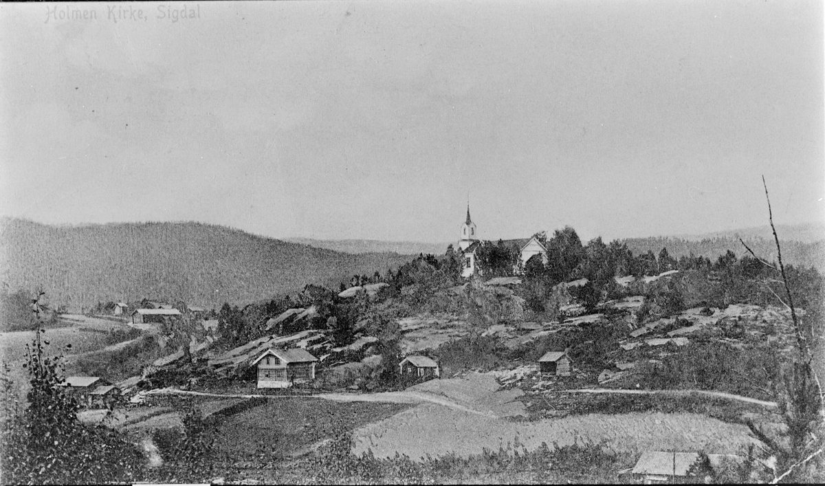 Utsyn mot Prestfoss med Holmen og Fossen gård. Ramstad i bakgrunnen. Postkortmotiv fra rundt 1910. 