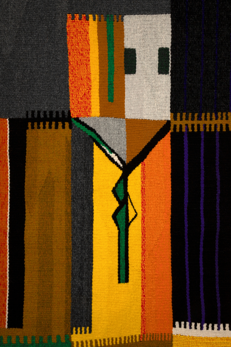 Motivet er i vertikal retning delt i sju felt. Hvert felt viser en stilisert overkropp med slips. Figurene viser variasjon i farger, form på hodet og hvilken retning figuren ser. Alle har forskjellige slips.