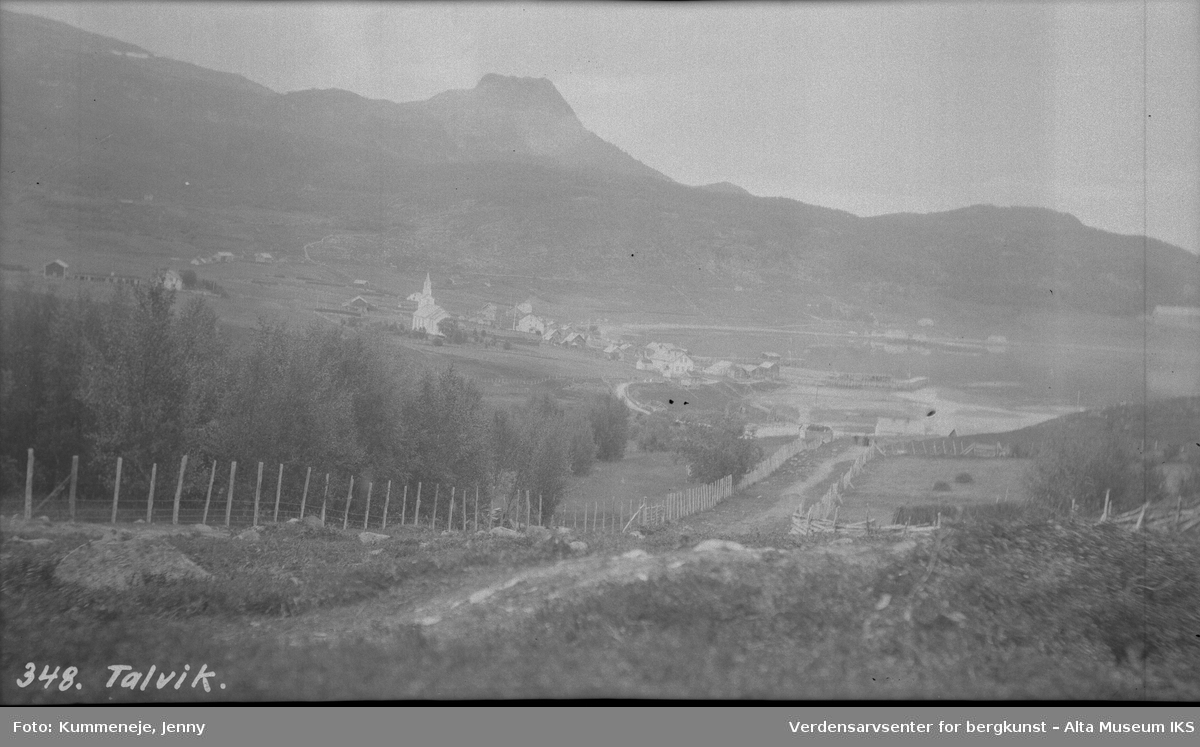 Landskapsbilde av Talvik. Kirke i bakgrunn, 1921