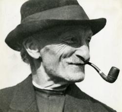 Portrett av mann med pipe i munnen.