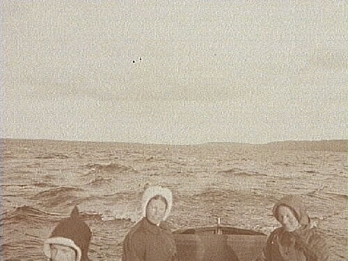 Granliden, Tisaren.
Tre personer i en båt ute på sjön.