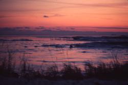 Solnedgang på Newfoundland sett fra M/S ‘Vikara’ (b.1973, Mi