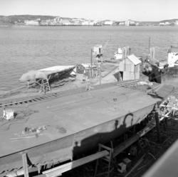 Bildet viser kaia og piren på Storviks Mek. Verksted og er t