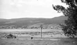 Foto av Eidsvågleirå, strand/langrunne ved lavt tidevann. Ta