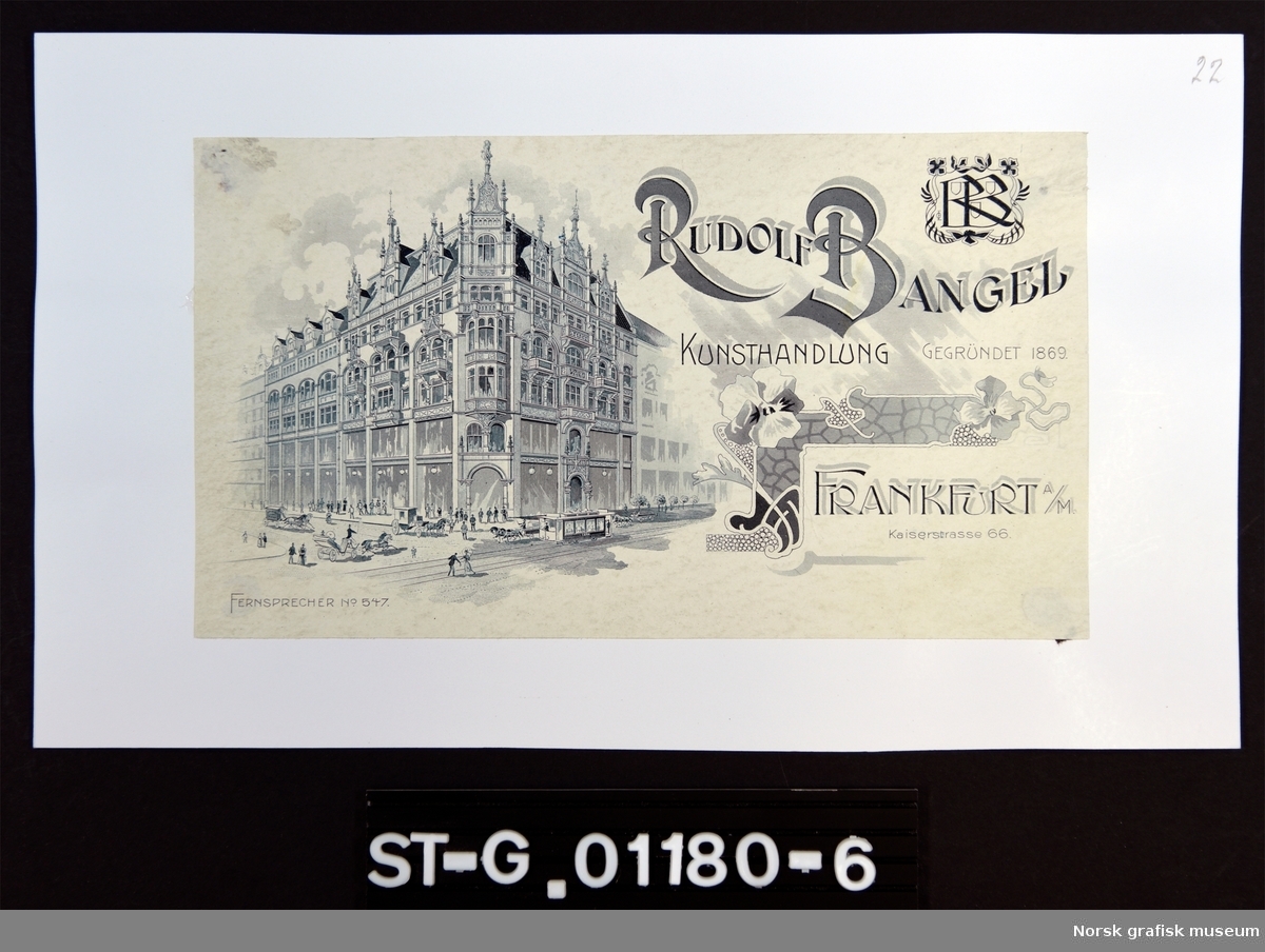 Brevhodet i sort/hvitt viser firmanavnet: "Rudolf Bangel kunsthandlung" til høyre og et motiv av en bygård/ magasinbygning på 6 etasjer, med rundbuede vinsuer, balkonger og spir.