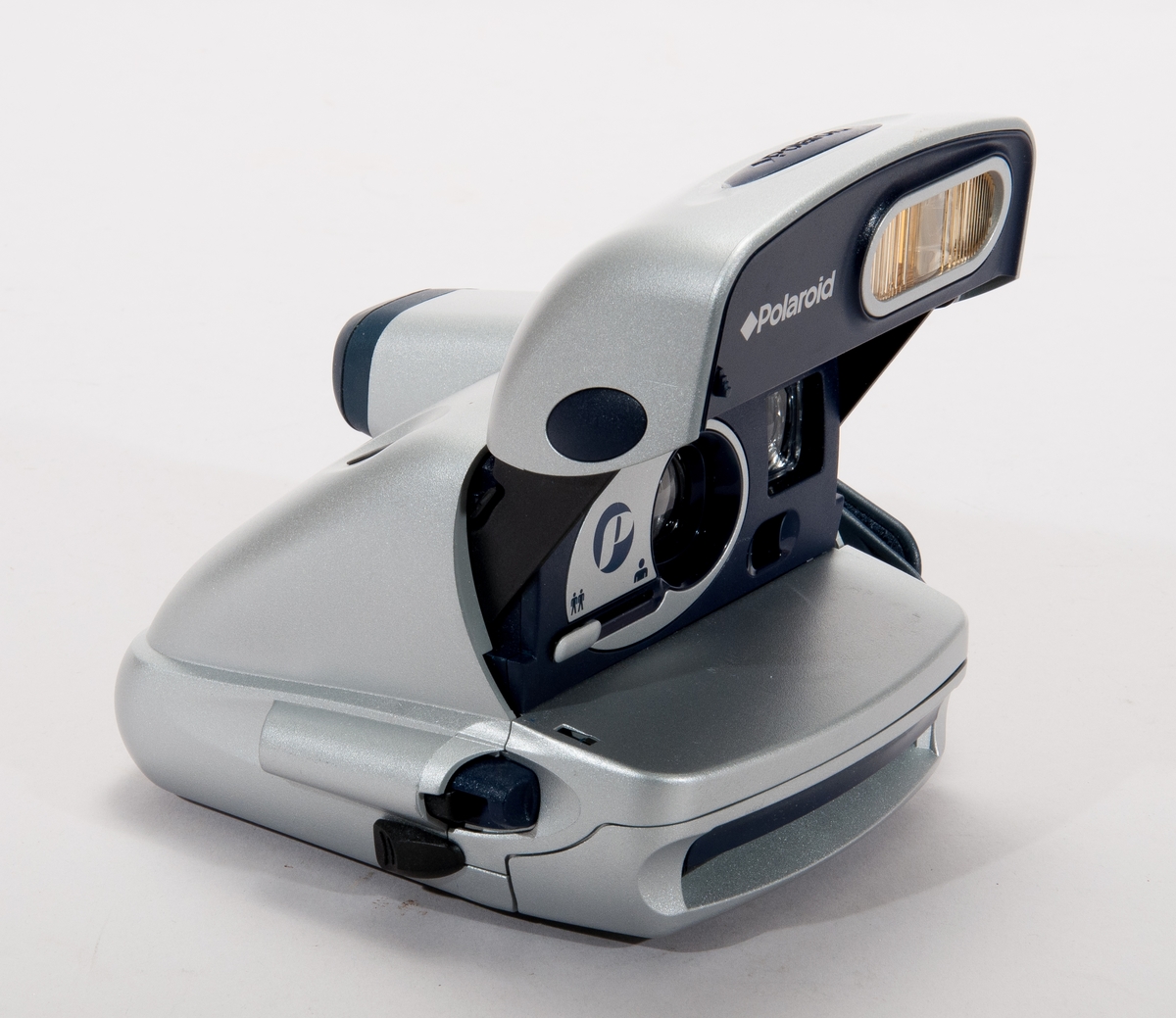 Direktbildskamera med blixt, för Polaroid-kassetter. Reglage för närbildstagning, inbyggd blixt.