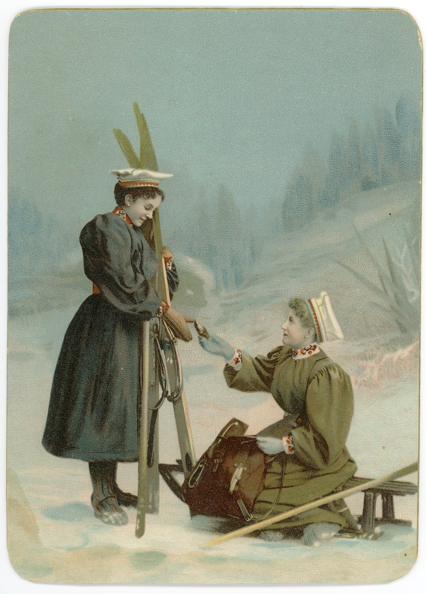 Postkort. Motivet på kortets fremside viser jenter med ski og kjelke.