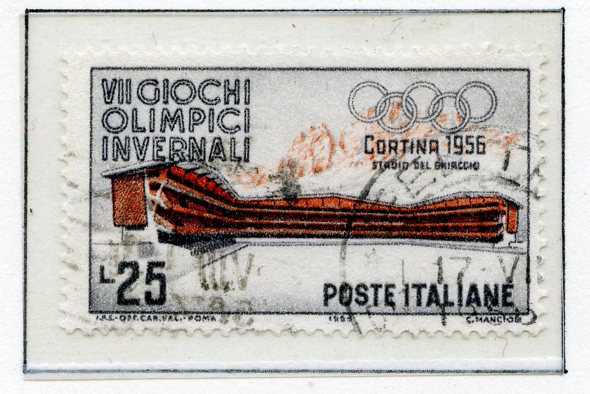 A4-ark med åtte, dvs to sett av fire ulike frimerker, fra vinterlekene i Cortina 1956. Det første settet er merket Vannmerke-I, og det andre med Vannmerke-II. 
Alle frimerkene har de olympiske ringer, med bilde av ulike olympiske arenaer.