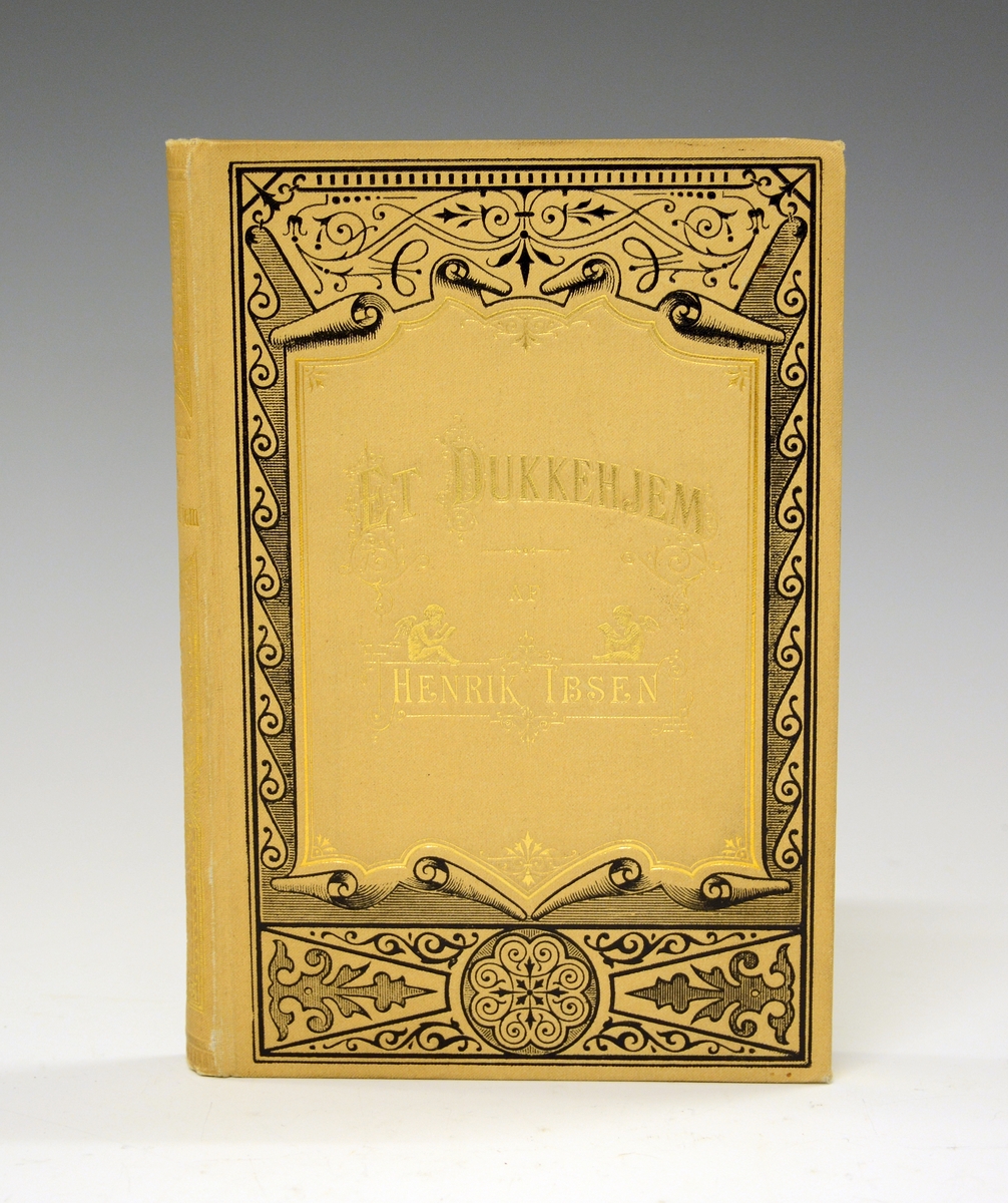 Ibsen, Henrik: Et Dukkehjem. Beige helshirtingsbind med preget dekor i gull og sort, helt gullsnitt. 
Tredje utgave 1880.