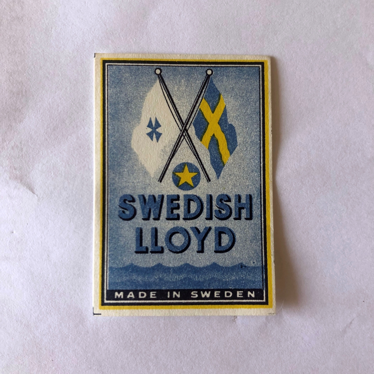 Text. Svenska flagga, Rederoet Swedish Lloyds flagga.
