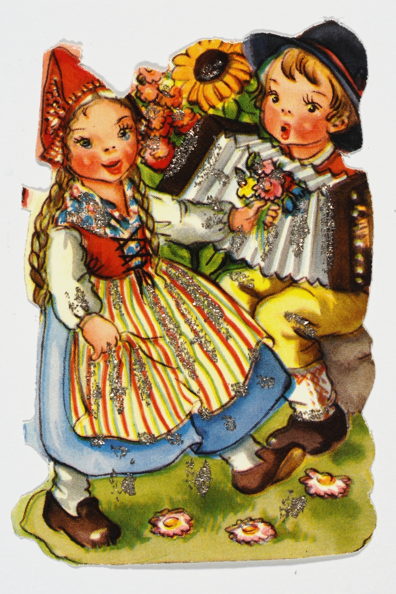 En dansende jente og en gutt som spiller trekkspill. De har drakter fra Tyrol.