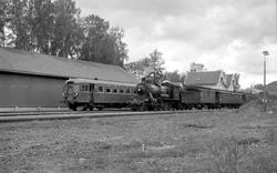 NSB damplok type 24b nr. 236 med NJK-tog på Flisa stasjon