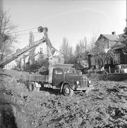 Nordre Åsen, Oslo, 15.11.1955. Veibygging, gravemaskin, last
