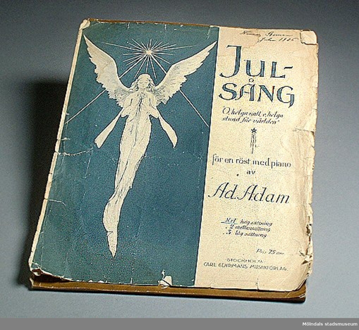 Nothäfte med julsång "O, helga natt, o, helga stund för världen" för en röst med piano av Ad. Adam med påskriften: Nanna Boman julen 1926.Välanvänd.