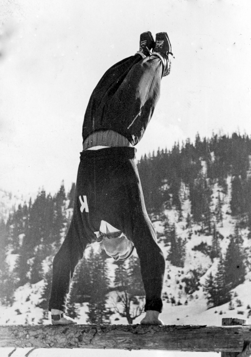 Norwegian athlete Birger Ruud showing off at Garmisch
