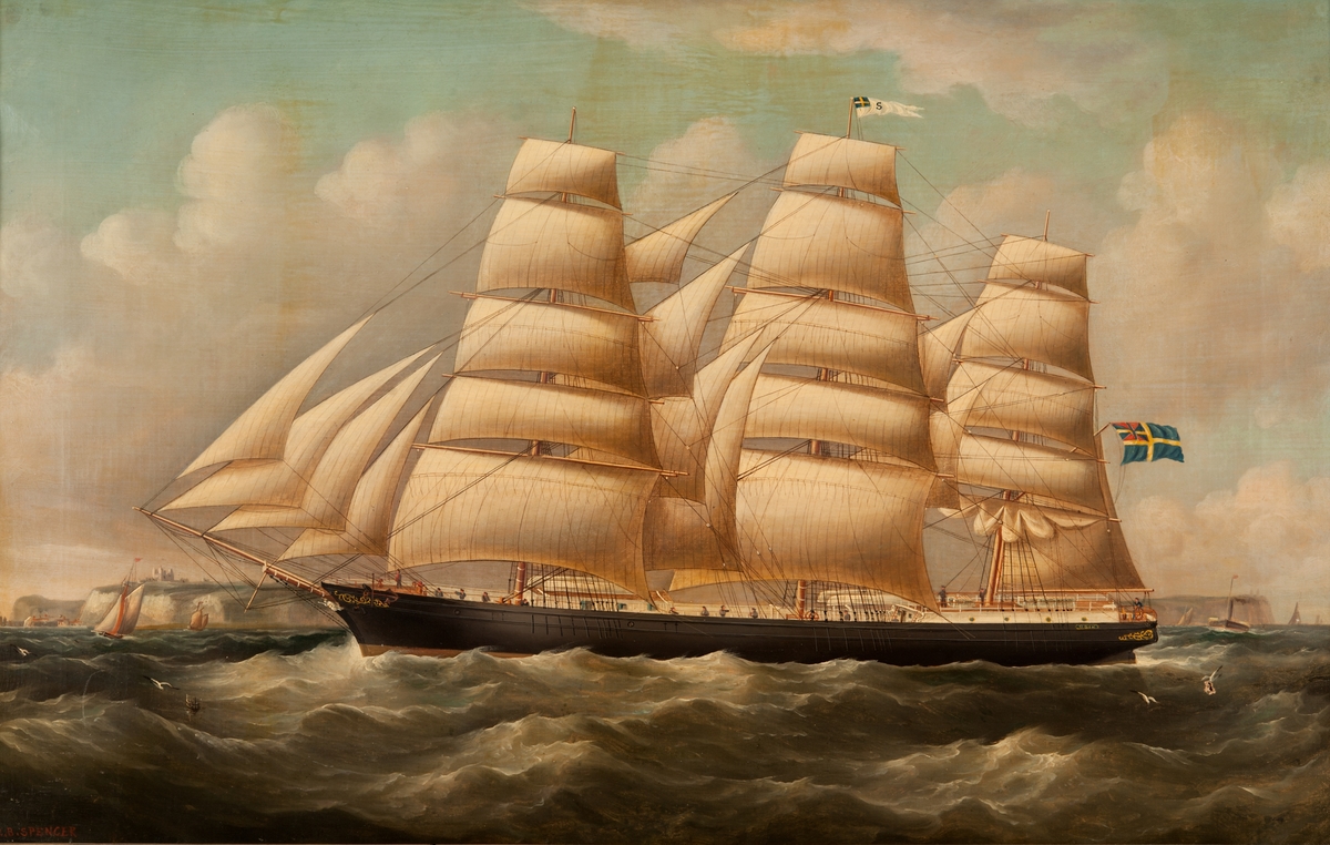 Fullriggaren ODIN seglande bidevind för styrbords halsar, visande läsida. I bakgrunden klipporna vid Dover, Sign. nedre vänstra hörnet: 'R.B. Spencer”.