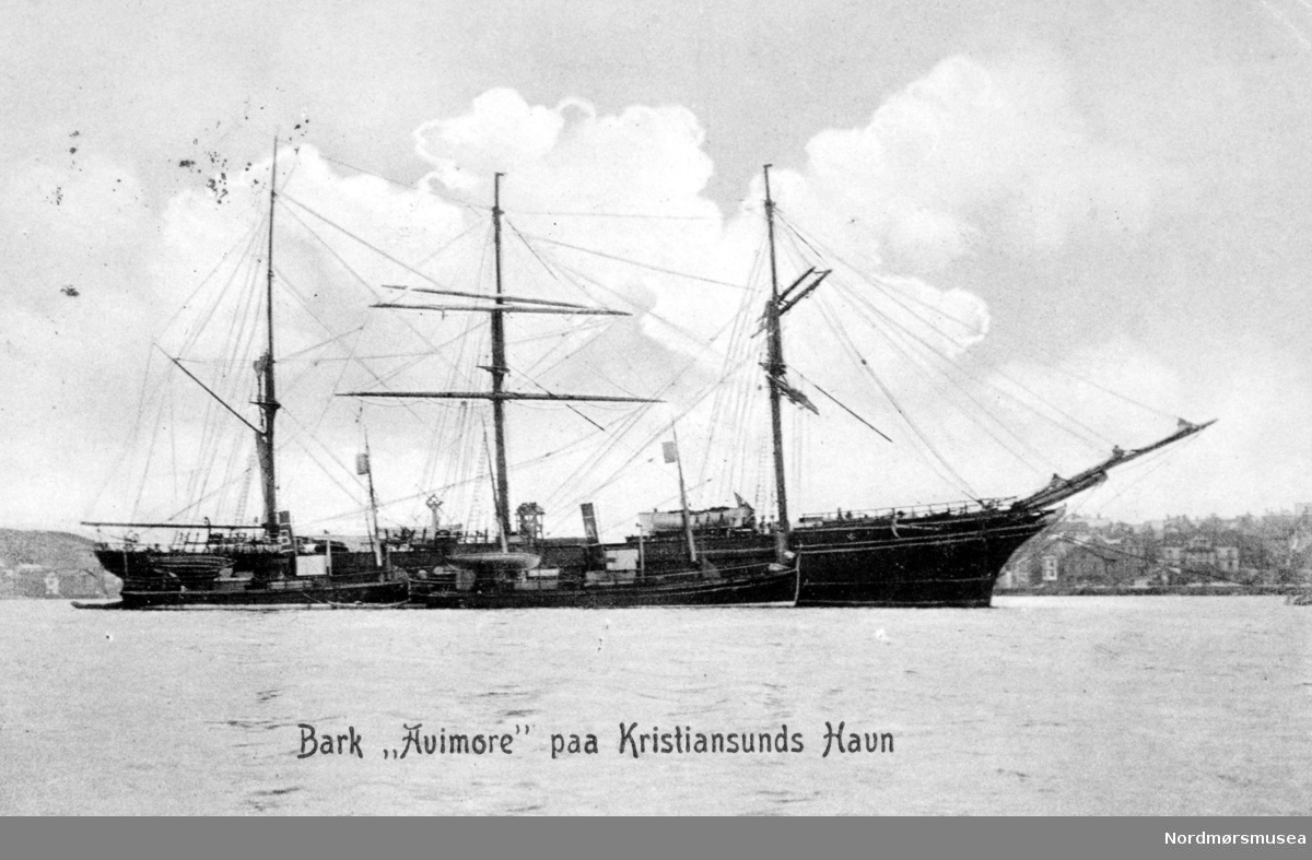 The picture shows AVIEMORE during the period 1905-08 when the ship was active as one of the early floating whale factories at Spitsbergen for Hvalfangerselskabet Alfa & Beta from Sandefjord. The two ships in front should be the whalecatchers ALFA and BETA - obviously distinguished by the funnel signs A and B, a rather unique approach I have not seen applied elsewhere. (Info: Axel Kuehn). - 
Postkort:
";Bark ";Avimore"; paa Kristiansunds havn."; Motiv av barken ";Avimore";, en norsk seilskute bygget i 1870. Skuten forsvant i Atlanteren i november 1917 under en reise fra Halifax-NS til Liverpool med trelast (kilde: www.wrecksite.eu). Fra Nordmøre museums fotosamlinger.