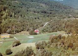 Flyfoto fra Gyl i Tingvoll kommune. Bildet er datert 30. jul