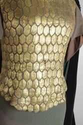 Costume Kirsten Flagstad in the role of Brünhilde in the Valkurie. A gold waistcoat with details similar to an armour.