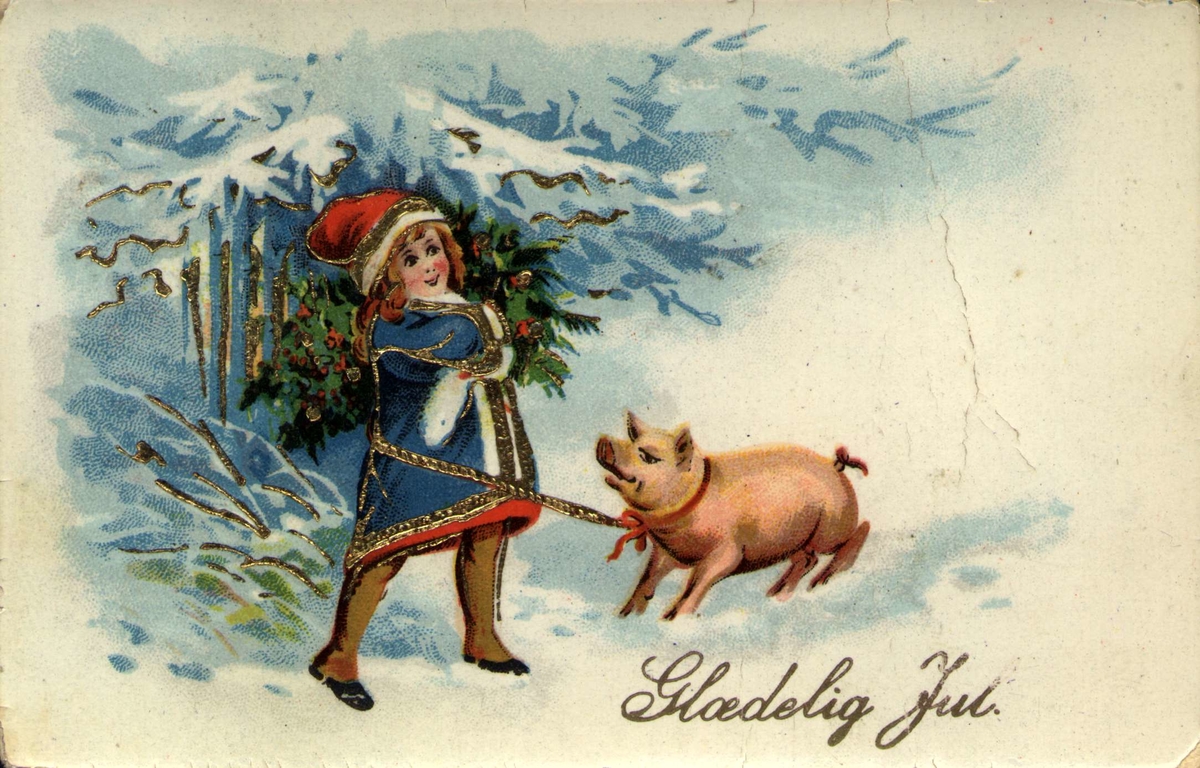 Julekort. Jule- og nyttårshilsen. Ei jente er på vei gjennom en skog med en gris i bånd og en kristtornbunt på skulderen. Stemplet 21.12.1929.