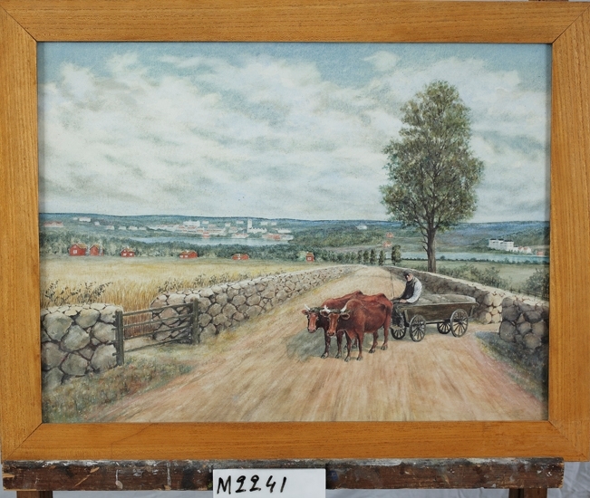 Akvarellmålning. 
Växjö från Thelestads backe, 1867. 
Ett oxspann på en grusväg mellan några stengärdesgårdar. I bakgrunden syns bl a Växjö stad och S:t Sigfrids sjukhus.