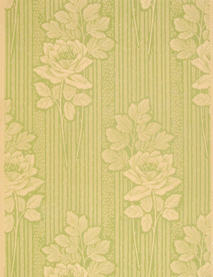 Randmönster med stor ros i diagonalupprepning. Tryck i gulgrönt på ofärgat papper.