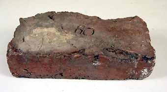 Murtegel, tegelsten av bränd lera L. 290 br. 150 H 67 mm."

Olshammars tegelbruk lades ner på 1920-talet