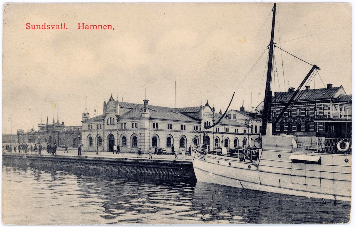 Vy med hamnen och Tullpackhuset. Bildtext till vykort "Sundsvall. Hamnen."