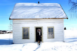 Kindredhuset sett fra forsiden dekket av snø