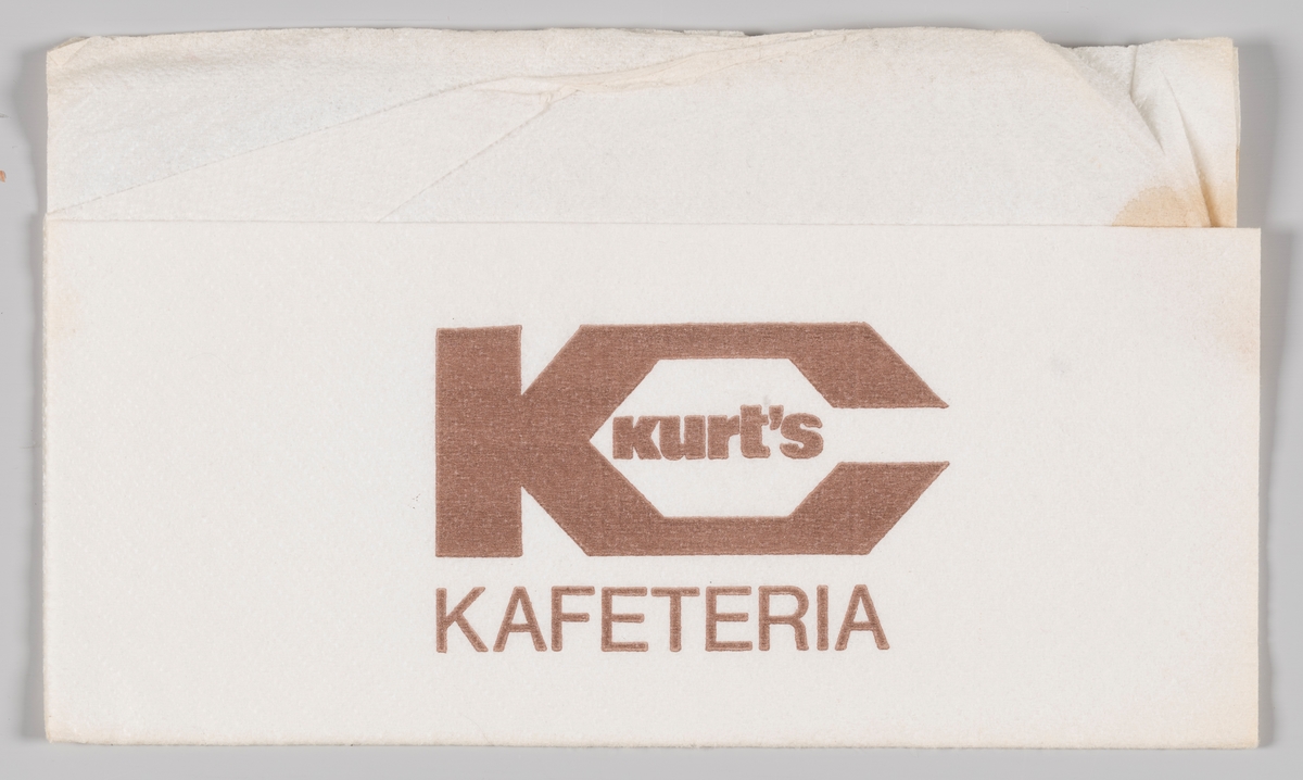 Et stort K og reklame for Kurt`s kafeteria.