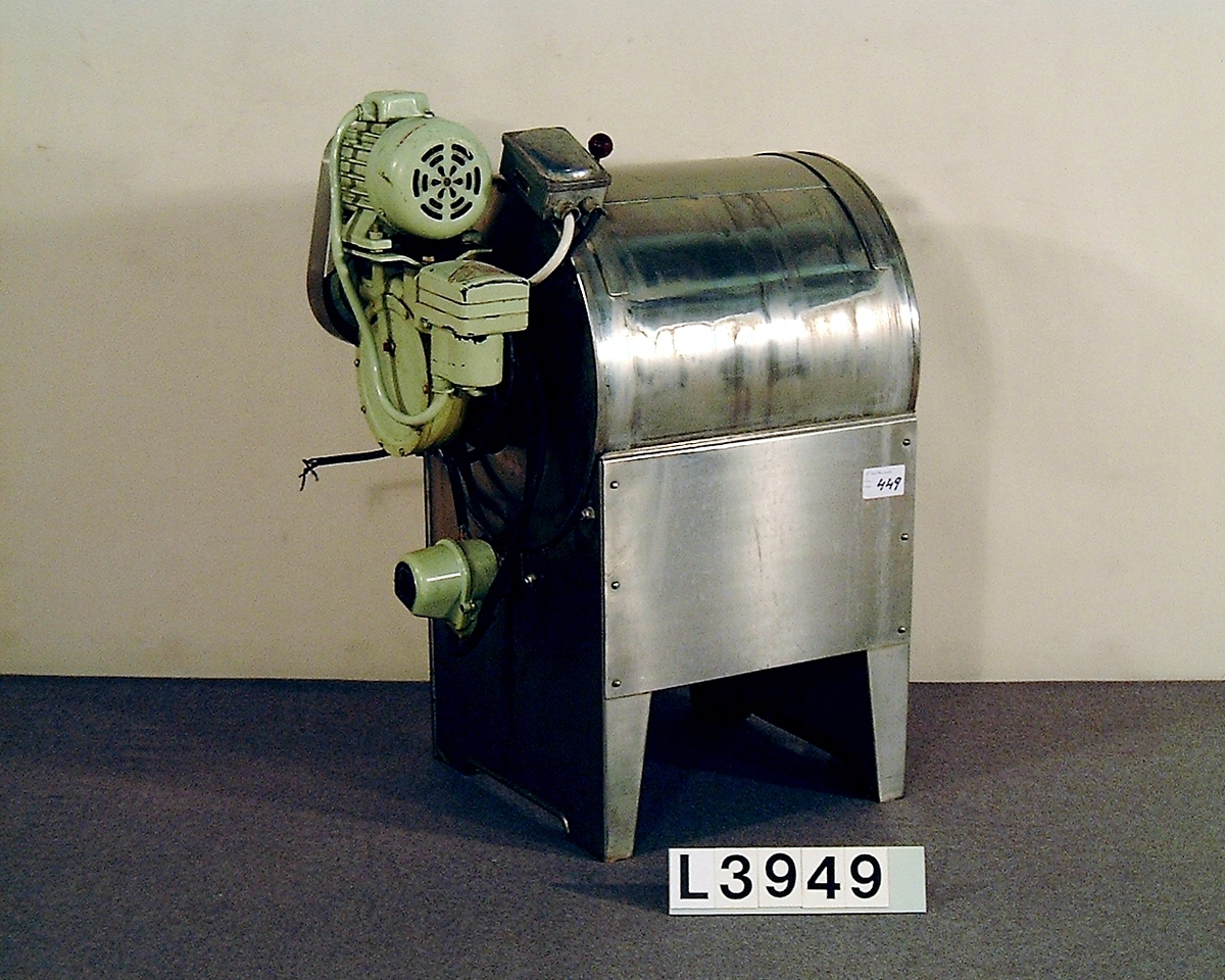 Toppmatad manuell cylindertvättmaskin i rostfritt för fastighetstvättstugor.