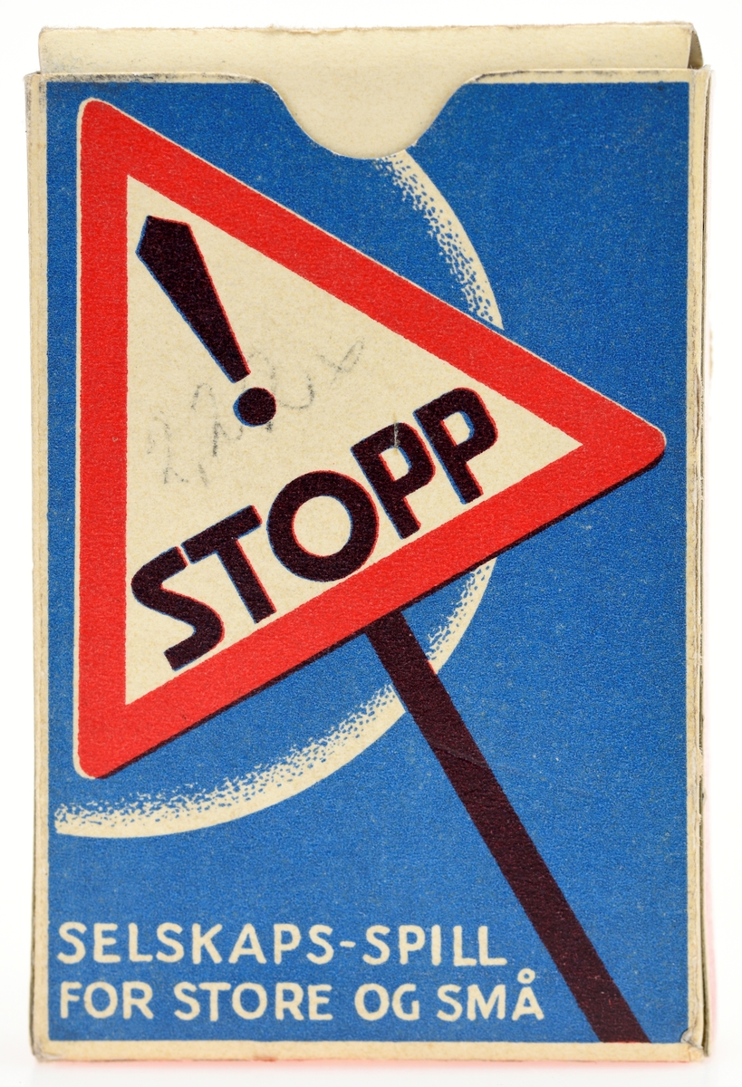 Motivet på esken er et stoppskilt, rød trekant med 
utropstegn og STOPP inni.