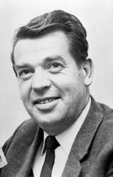 R: HAM-KAM. JUBILEUMSBOK. JOHN HANSEN (f. 1929), PORTRETT. P