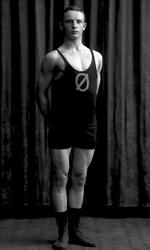 Portrett, mann i bryterdrakt, Georg Brustad.