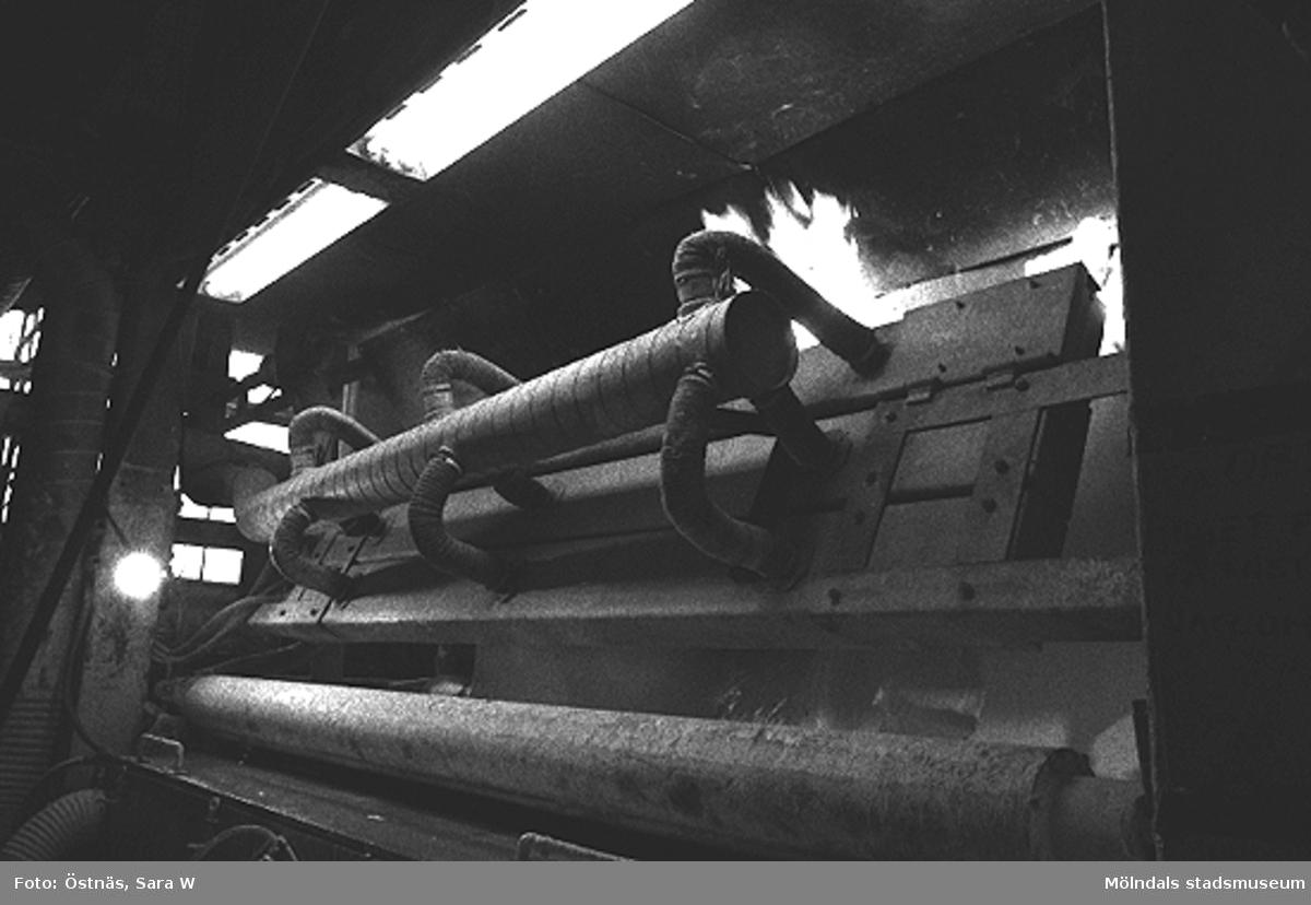 Detalj av en maskin för papperstillverkning, 1980-tal.
Bilden ingår i serie från produktion och interiör på pappersindustrin Papyrus.
