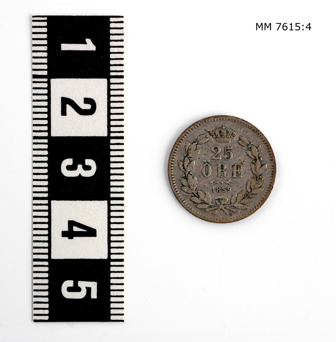 Mynt, svenskt, av silver. 25 öre från år 1859 Oscar II:s tid.